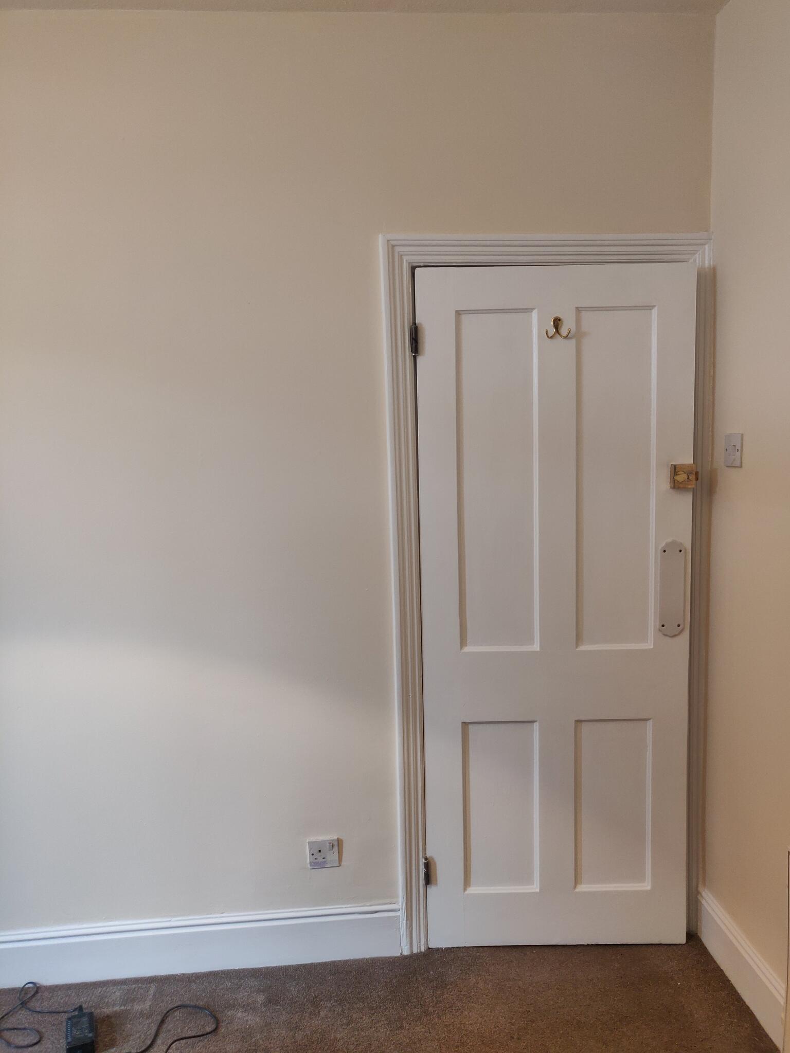 Spotless finished room with flawless walls and woodwork