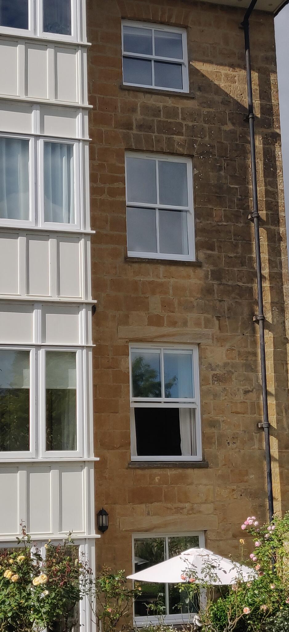 Front elevation — window and door refinished in black